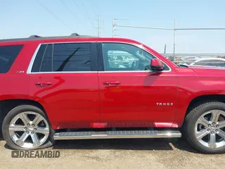 2015 Chevrolet Tahoe LT with VIN 1GNSKBKC6FR628355, listed as a IAAI auction lot 42159743 with 95,730 mi miles and . Bid and sale history available at DreamBid. Image 13.