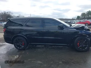 2023 Dodge Durango SRT Hellcat Premium with VIN 1C4SDJH90PC557375, listed as a IAAI auction lot 41328850 with 30,697 mi miles and . Bid and sale history available at DreamBid. Image 12.
