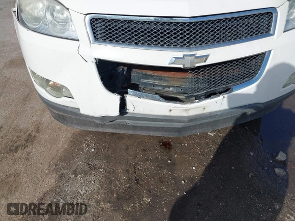 2012 Chevrolet Traverse LS with VIN 1GNKRFEDXCJ401428, listed as a IAAI auction lot 41801656 with 141,242 mi miles and . Bid and sale history available at DreamBid. Image 6.