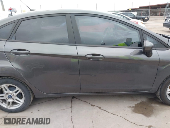 2018 Ford Fiesta SE with VIN 3FADP4BJXJM136232, listed as a IAAI auction lot 41901540 with 119,065 mi miles and . Bid and sale history available at DreamBid. Image 14.