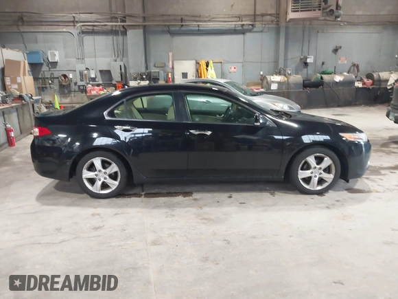 2012 Acura TSX with VIN JH4CU2F49CC010017, listed as a IAAI auction lot 42144097 with 217,581 mi miles and . Bid and sale history available at DreamBid. Image 13.