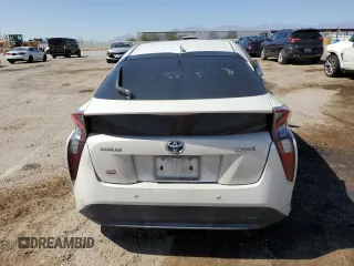 2018 Toyota Prius Two z VIN JTDKARFU0J3054693, wystawiony jako Copart lot #57581855 z przebiegiem 51 684 mil mil oraz Szkoda całkowita • Salvage title. Historia ofert i sprzedaży dostępna na DreamBid. Obrazek 6.