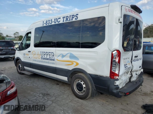 2021 Ford Transit with VIN 1FDAX2CG2MKA23709, listed as a Copart auction lot 74054214 with 105,503 mi miles and Salvage Title. Bid and sale history available at DreamBid. Image 2.