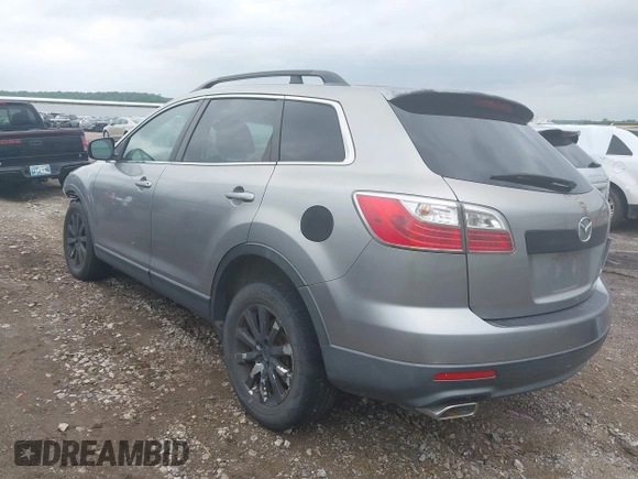 2010 Mazda CX-9 Grand Touring with VIN JM3TB3MA9A0208950, listed as a IAAI auction lot 42133824 with 225,222 mi miles and . Bid and sale history available at DreamBid. Image 3.