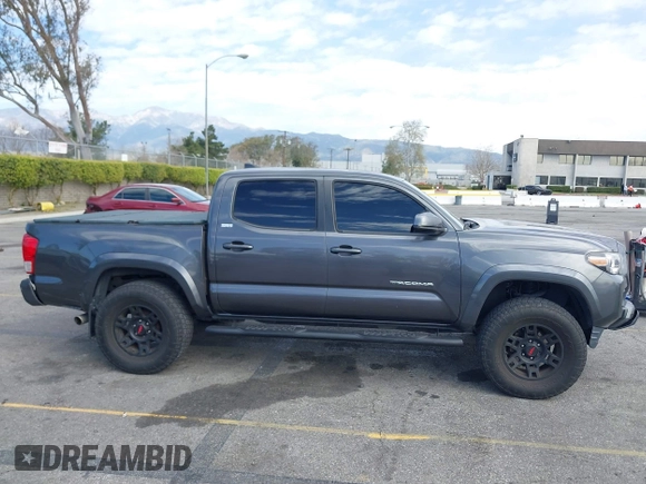 2017 Toyota Tacoma SR5 with VIN 3TMAZ5CN7HM036078, listed as a IAAI auction lot 41698163 with 91,376 mi miles. Bid and sale history available at carsss.com. Image 13.