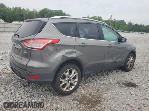2013 Ford Escape SEL z VIN 1FMCU9HX7DUC11052, wystawiony jako Copart lot #62377515 z przebiegiem 225 704 mil mil oraz Szkoda całkowita • Salvage title. Historia ofert i sprzedaży dostępna na DreamBid. Obrazek 3.