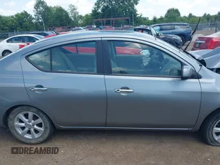 2012 Nissan Versa SV with VIN 3N1CN7APXCL812936, listed as a IAAI auction lot 42533280 with 78,071 mi miles and . Bid and sale history available at DreamBid. Image 14.