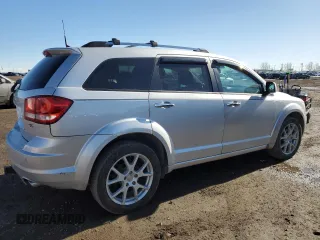 2012 Dodge Journey SXT with VIN 3C4PDCCG7CT135822, listed as a Copart auction lot 48820205 with 253,183 mi miles and Clean title. Bid and sale history available at DreamBid. Image 3.