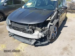 2017 Chrysler Pacifica Touring L with VIN 2C4RC1BG0HR826881, listed as a IAAI auction lot 42171240 with 214,188 mi miles and . Bid and sale history available at DreamBid. Image 6.