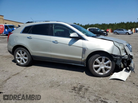2015 Cadillac SRX Performance Collection z VIN 3GYFNCE31FS638057, wystawiony jako Copart lot #52454065 z przebiegiem 198 417 mil mil oraz Czysty tytuł • Clean title. Historia ofert i sprzedaży dostępna na DreamBid. Obrazek 4.