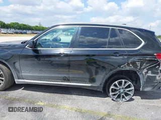 2016 BMW X5 xDrive50i with VIN 5UXKR6C51G0J81658, listed as a IAAI auction lot 41801382 with 34,572 mi miles. Bid and sale history available at carsss.com. Image 15.