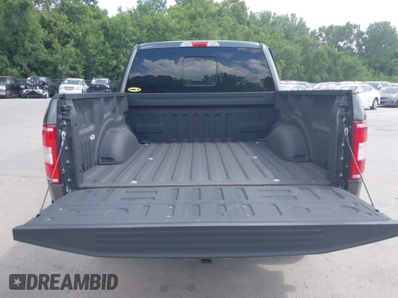 2018 Ford F-150 XL with VIN 1FTEW1E57JFA95086, listed as a IAAI auction lot 42574704 with 77,301 mi miles and . Bid and sale history available at DreamBid. Image 17.
