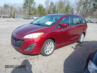 2012 Mazda 5 Grand Touring with VIN JM1CW2DL3C0144402, listed as a IAAI auction lot 41923524 with 150,584 mi miles and . Bid and sale history available at DreamBid. Image 2.