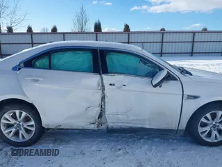 2011 Ford Taurus SEL z VIN 1FAHP2EW2BG143071, wystawiony jako IAAI lot #41538097 z przebiegiem 126 668 mil mil oraz . Historia ofert i sprzedaży dostępna na DreamBid. Obrazek 13.
