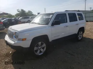 2014 Jeep Patriot Latitude with VIN 1C4NJRFB6ED792039, listed as a Copart auction lot 63076565 with 215,522 mi miles and Salvage title. Bid and sale history available at DreamBid. Image 1.