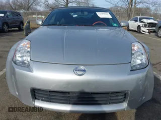 2005 Nissan 350Z Touring z VIN JN1AZ36A05M755776, wystawiony jako IAAI lot #41509506 z przebiegiem 79 148 mil mil oraz . Historia ofert i sprzedaży dostępna na DreamBid. Obrazek 12.