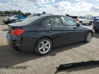 2015 BMW 3 Series 328i xDrive with VIN WBA3B5C52FF960001, listed as a Copart auction lot 52235695 with 80,950 mi miles and Salvage Title. Bid and sale history available at carsss.com. Image 3.