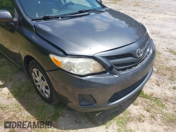 2011 Toyota Corolla L with VIN 2T1BU4EE0BC680158, listed as a IAAI auction lot 42060987 with 131,669 mi miles. Bid and sale history available at carsss.com. Image 6.