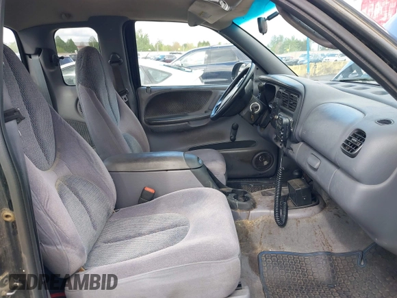1999 Dodge Dakota SLT with VIN 1B7GG22YXXS229633, listed as a IAAI auction lot 42088939 with 148,049 mi miles and . Bid and sale history available at carsss.com. Image 5.