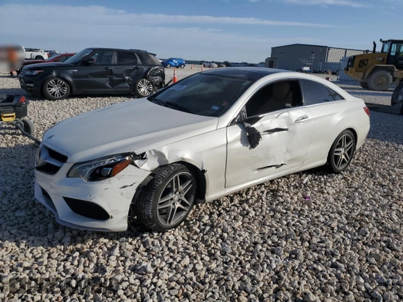 2017 Mercedes-Benz E-Class E 400 with VIN WDDKJ6FB4HF355771, listed as a Copart auction lot 47932885 with 64,065 mi miles and Salvage Title. Bid and sale history available at carsss.com. Image 1.