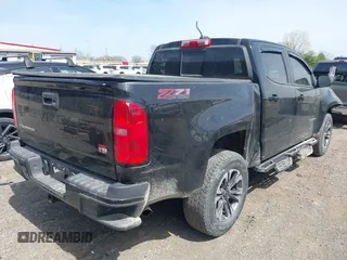 2021 Chevrolet Colorado 4WD Z71 z VIN 1GCGTDEN1M1256939, wystawiony jako IAAI lot #42071364 z przebiegiem 38 972 mil mil oraz . Historia ofert i sprzedaży dostępna na DreamBid. Obrazek 4.