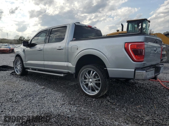 2023 Ford F-150 XL with VIN 1FTEW1C50PKF91124, listed as a Copart auction lot 51538865 with 22,128 mi miles and Salvage title. Bid and sale history available at DreamBid. Image 2.