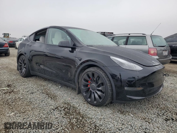 2024 Tesla Model Y Performance with VIN 7SAYGDEF1RF028278, listed as a Copart auction lot 48900935 with 41,606 mi miles and Salvage Title. Bid and sale history available at DreamBid. Image 4.