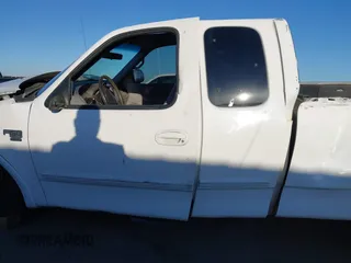 1999 Ford F-150 XL с VIN 1FTRX18L0XKB29703, выставлен на аукционе IAAI как лот 41644163 с пробегом Не указан миль и . История ставок и продаж доступна на DreamBid. Изображение 14.