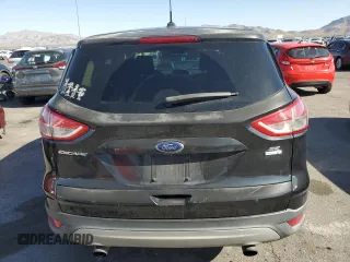 2014 Ford Escape SE z VIN 1FMCU9G9XEUB47481, wystawiony jako Copart lot #57571105 z przebiegiem 153 943 mil mil oraz Czysty tytuł • Clean title. Historia ofert i sprzedaży dostępna na DreamBid. Obrazek 6.
