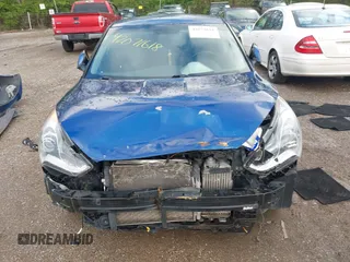 2015 Hyundai Veloster Turbo with VIN KMHTC6AE1FU241662, listed as a IAAI auction lot 42071618 with Not provided miles and . Bid and sale history available at DreamBid. Image 11.