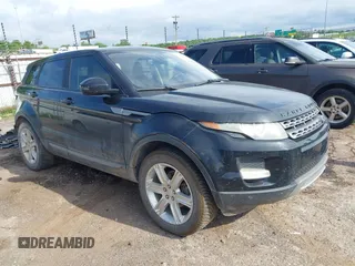 2015 Land Rover Range Rover Evoque Pure Premium z VIN SALVR2BGXFH059920, wystawiony jako IAAI lot #42325121 z przebiegiem 165 618 mil mil oraz . Historia ofert i sprzedaży dostępna na DreamBid. Obrazek 1.