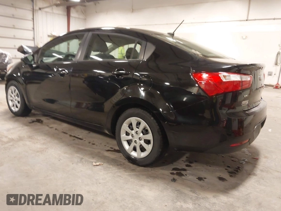2014 Kia Rio LX with VIN KNADM4A32E6409785, listed as a IAAI auction lot 41810262 with 183,669 mi miles. Bid and sale history available at carsss.com. Image 3.