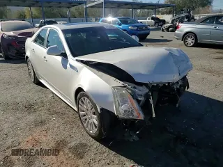2012 Cadillac CTS Premium z VIN 1G6DP5E3XC0151349, wystawiony jako Copart lot #87004164 z przebiegiem 72 433 mil mil oraz Szkoda całkowita • Salvage title. Historia ofert i sprzedaży dostępna na DreamBid. Obrazek 13.