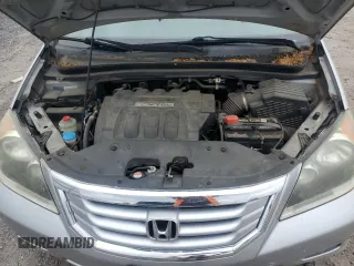 2010 Honda Odyssey LX z VIN 5FNRL3H29AB016853, wystawiony jako Copart lot #56602085 z przebiegiem 154 518 mil mil oraz Szkoda całkowita • Salvage title. Historia ofert i sprzedaży dostępna na DreamBid. Obrazek 12.