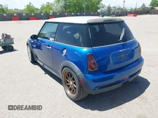 2006 MINI Hardtop S with VIN WMWRE33576TL24276, listed as a IAAI auction lot 42278094 with 148,269 mi miles and . Bid and sale history available at DreamBid. Image 3.