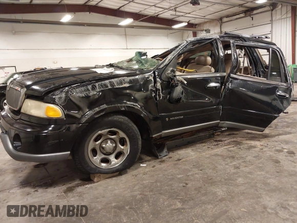 2001 Lincoln Navigator with VIN 5LMFU28A11LJ03590, listed as a IAAI auction lot 42442449 with Not provided miles and . Bid and sale history available at DreamBid. Image 2.