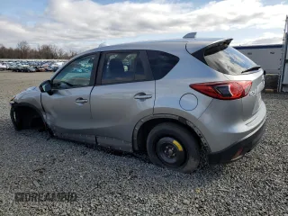 2014 Mazda CX-5 Touring with VIN JM3KE4CY4E0427294, listed as a Copart auction lot 51372155 with 121,324 mi miles and Salvage Title. Bid and sale history available at carsss.com. Image 2.
