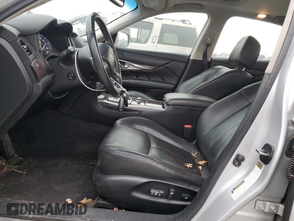 2012 Infiniti M Hybrid with VIN JN1EY1AP9CM910360, listed as a Copart auction lot 80273314 with 121,217 mi miles and Clean title. Bid and sale history available at DreamBid. Image 7.