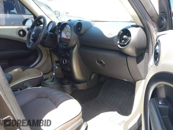 2013 MINI Countryman S ALL4 with VIN WMWZC5C54DWP34224, listed as a IAAI auction lot 42141400 with 33,307 mi miles and . Bid and sale history available at DreamBid. Image 5.