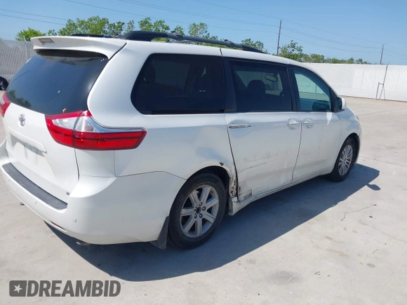 2015 Toyota Sienna XLE with VIN 5TDYK3DCXFS663083, listed as a IAAI auction lot 41967621 with 177,472 mi miles and . Bid and sale history available at DreamBid. Image 4.
