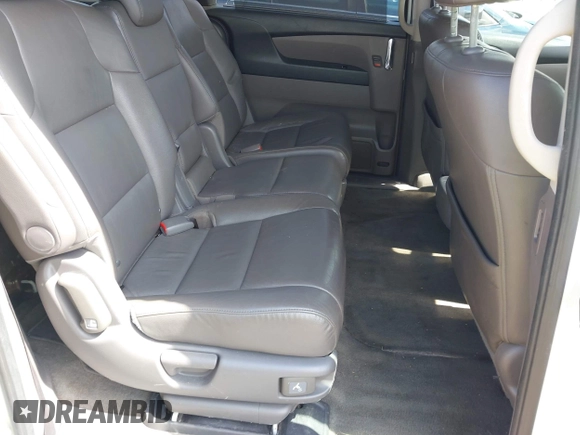2014 Honda Odyssey EX-L with VIN 5FNRL5H69EB048867, listed as a IAAI auction lot 42190464 with 172,487 mi miles and . Bid and sale history available at carsss.com. Image 8.