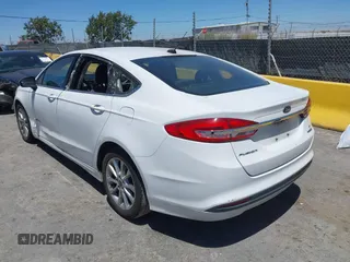 2017 Ford Fusion Hybrid SE with VIN 3FA6P0LU3HR326980, listed as a IAAI auction lot 42692591 with 141,122 mi miles and . Bid and sale history available at DreamBid. Image 3.