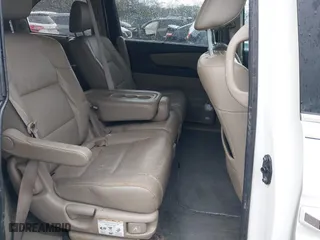 2015 Honda Odyssey Touring Elite with VIN 5FNRL5H98FB076428, listed as a IAAI auction lot 41998339 with 114,573 mi miles. Bid and sale history available at carsss.com. Image 8.