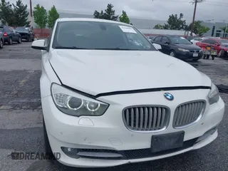 2011 BMW 5 Series GT 550i with VIN WBASN4C59BC210040, listed as a IAAI auction lot 42140088 with 130,771 mi miles. Bid and sale history available at carsss.com. Image 6.