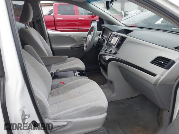 2012 Toyota Sienna LE with VIN 5TDJK3DC3CS048579, listed as a IAAI auction lot 41055074 with 202,791 mi miles. Bid and sale history available at carsss.com. Image 5.