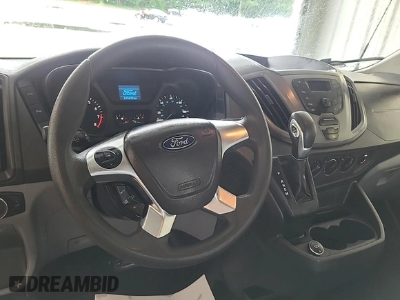 2019 Ford Transit with VIN 1FTYR2CM5KKA04040, listed as a IAAI auction lot 42715725 with 175,169 mi miles and . Bid and sale history available at DreamBid. Image 21.