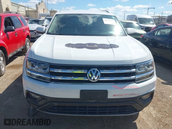 2018 Volkswagen Atlas SE with VIN 1V2CR2CA5JC520616, listed as a IAAI auction lot 42198409 with 98,133 mi miles and . Bid and sale history available at DreamBid. Image 12.