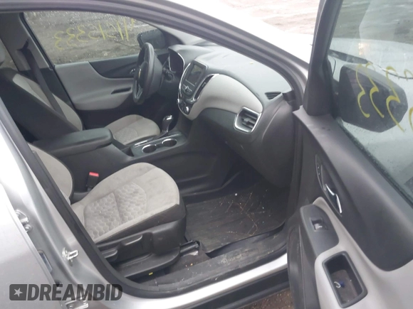 2019 Chevrolet Equinox LS z VIN 3GNAXHEV9KS640830, wystawiony jako IAAI lot #41515333 z przebiegiem 105 077 mil mil oraz . Historia ofert i sprzedaży dostępna na DreamBid. Obrazek 5.