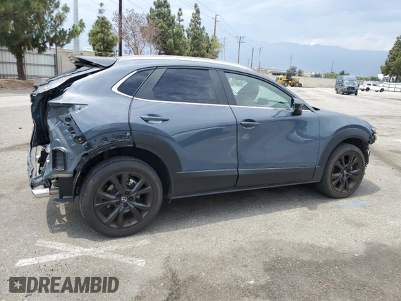 2023 Mazda CX-30 S Carbon Edition with VIN 3MVDMBCM5PM560912, listed as a Copart auction lot 59174445 with 5,247 mi miles and Salvage title. Bid and sale history available at DreamBid. Image 3.