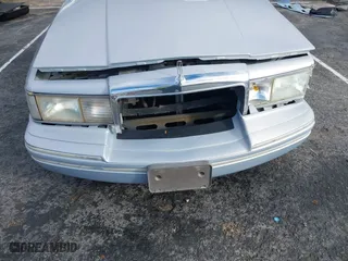 1993 Lincoln Town Car Executive with VIN 1LNLM81W6PY618899, listed as a IAAI auction lot 41566437 with 158,821 mi miles. Bid and sale history available at carsss.com. Image 6.